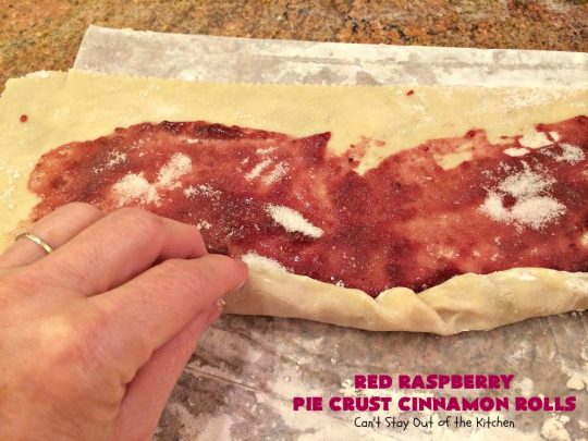 Red Raspberry Pie Crust Cinnamon Rolls | Can't Stay Out of the Kitchen | These #CinnamonRolls are awesome! My brothers and I would fight over them growing up. Homemade Pie Crust is filled with #RedRaspberryJam & sprinkled with cinnamon & sugar. These treats just dissolve in your mouth. Great for a #holiday #breakfast or for a snack any time--day or night! #Christmas #RedRaspberryPieCrustCinnamonRolls #brunch #HolidayBreakfast