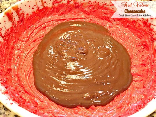 Red Velvet Cheesecake | Can't Stay Out of the Kitchen | this outrageous #dessert has an #Oreo, almond & chocolate chip crust and is filled with milk #chocolate & cream cheese for a velvety, creamy texture you'll love. Great for #Valentine'sDay.