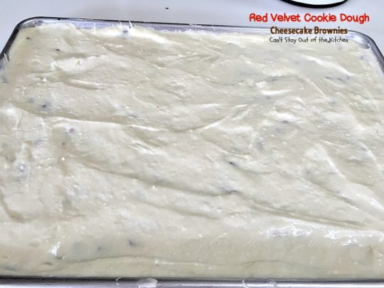 Red Velvet Cookie Dough Cheesecake Brownies | Can't Stay Out of the Kitchen | these awesome #redvelvet #brownies have a yummy #cheesecake layer and they're filled with #whitechocolatechips. Every bite is amazing. #dessert #chocolate