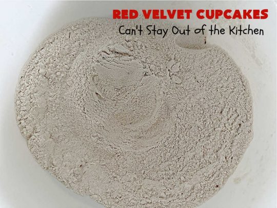 Red Velvet Cupcakes | Can't Stay Out of the Kitchen | These luscious #RedVelvet #cupcakes are so rich, decadent & heavenly you won't be able to stay out of them! The #CreamCheese #Frosting puts them over the top. Perfect #holiday treats for #Christmas or #ValentinesDay. #dessert #chocolate #RedVelvetDessert #ChocolateDessert #HolidayDessert #ValentinesDessert #ChristmasDessert #RedVelvetCupcakes