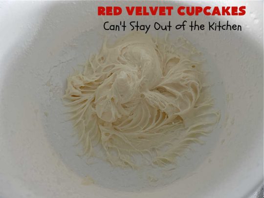 Red Velvet Cupcakes | Can't Stay Out of the Kitchen | These luscious #RedVelvet #cupcakes are so rich, decadent & heavenly you won't be able to stay out of them! The #CreamCheese #Frosting puts them over the top. Perfect #holiday treats for #Christmas or #ValentinesDay. #dessert #chocolate #RedVelvetDessert #ChocolateDessert #HolidayDessert #ValentinesDessert #ChristmasDessert #RedVelvetCupcakes