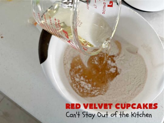 Red Velvet Cupcakes | Can't Stay Out of the Kitchen | These luscious #RedVelvet #cupcakes are so rich, decadent & heavenly you won't be able to stay out of them! The #CreamCheese #Frosting puts them over the top. Perfect #holiday treats for #Christmas or #ValentinesDay. #dessert #chocolate #RedVelvetDessert #ChocolateDessert #HolidayDessert #ValentinesDessert #ChristmasDessert #RedVelvetCupcakes