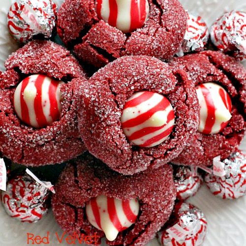 Red Velvet Peppermint Kisses | Can't Stay Out of the Kitchen | these #RedVelvet #cookies are heavenly! #Hershey's peppermint-flavored candy cane kisses are put in the centers adding divine flavor. #chocolate #dessert