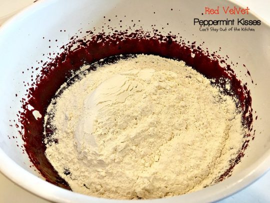 Red Velvet Peppermint Kisses | Can't Stay Out of the Kitchen | these #RedVelvet #cookies are heavenly! #Hershey's peppermint-flavored candy cane kisses are put in the centers adding divine flavor. #chocolate #dessert