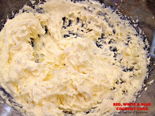 Red, White & Blue Coconut Cake | Can't Stay Out of the Kitchen | this fabulous #coconut #cake is perfect for the #FourthofJuly. Both the cake and the icing have coconut. Amazing #dessert