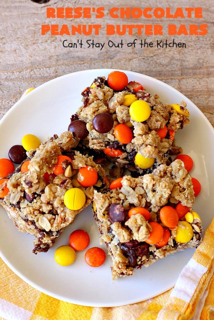 Reese's Chocolate Peanut Butter Bars | Can't Stay Out of the Kitchen | these outrageous #cookies start with an #OatmealCookie & #PeanutButter crust & topping. They have a #chocolate sauce & #ReesesPeanutButterCandies in the middle. Absolutely awesome! #tailgating #brownie #dessert #ChocolateDessert #PeanutButterDessert #ReesesPeanutButterDessert #ReesesChocolatePeanutButterBars