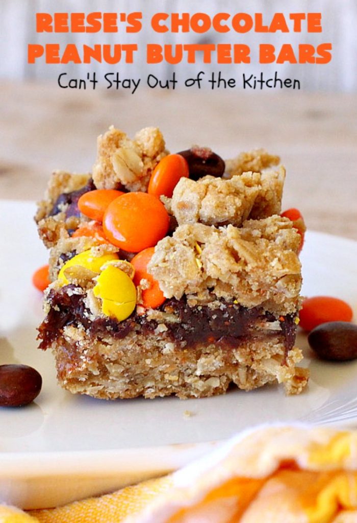 Reese's Chocolate Peanut Butter Bars | Can't Stay Out of the Kitchen | these outrageous #cookies start with an #OatmealCookie & #PeanutButter crust & topping. They have a #chocolate sauce & #ReesesPeanutButterCandies in the middle. Absolutely awesome! #tailgating #brownie #dessert #ChocolateDessert #PeanutButterDessert #ReesesPeanutButterDessert #ReesesChocolatePeanutButterBars