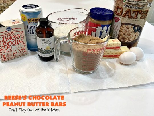 Reese's Chocolate Peanut Butter Bars | Can't Stay Out of the Kitchen | these outrageous #cookies start with an #OatmealCookie & #PeanutButter crust & topping. They have a #chocolate sauce & #ReesesPeanutButterCandies in the middle. Absolutely awesome! #tailgating #brownie #dessert #ChocolateDessert #PeanutButterDessert #ReesesPeanutButterDessert #ReesesChocolatePeanutButterBars