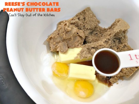 Reese's Chocolate Peanut Butter Bars | Can't Stay Out of the Kitchen | these outrageous #cookies start with an #OatmealCookie & #PeanutButter crust & topping. They have a #chocolate sauce & #ReesesPeanutButterCandies in the middle. Absolutely awesome! #tailgating #brownie #dessert #ChocolateDessert #PeanutButterDessert #ReesesPeanutButterDessert #ReesesChocolatePeanutButterBars