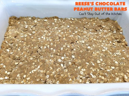 Reese's Chocolate Peanut Butter Bars | Can't Stay Out of the Kitchen | these outrageous #cookies start with an #OatmealCookie & #PeanutButter crust & topping. They have a #chocolate sauce & #ReesesPeanutButterCandies in the middle. Absolutely awesome! #tailgating #brownie #dessert #ChocolateDessert #PeanutButterDessert #ReesesPeanutButterDessert #ReesesChocolatePeanutButterBars