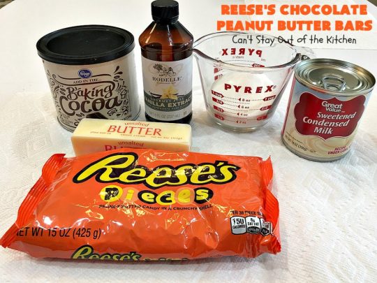 Reese's Chocolate Peanut Butter Bars | Can't Stay Out of the Kitchen | these outrageous #cookies start with an #OatmealCookie & #PeanutButter crust & topping. They have a #chocolate sauce & #ReesesPeanutButterCandies in the middle. Absolutely awesome! #tailgating #brownie #dessert #ChocolateDessert #PeanutButterDessert #ReesesPeanutButterDessert #ReesesChocolatePeanutButterBars