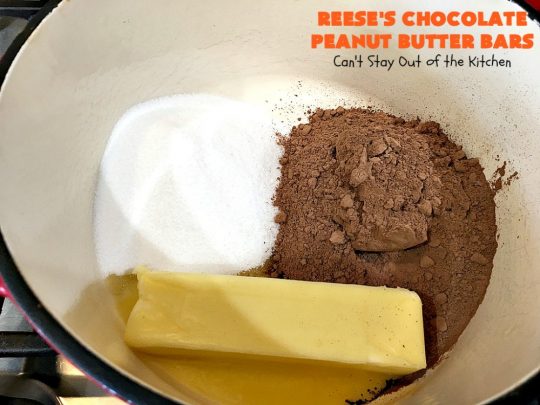 Reese's Chocolate Peanut Butter Bars | Can't Stay Out of the Kitchen | these outrageous #cookies start with an #OatmealCookie & #PeanutButter crust & topping. They have a #chocolate sauce & #ReesesPeanutButterCandies in the middle. Absolutely awesome! #tailgating #brownie #dessert #ChocolateDessert #PeanutButterDessert #ReesesPeanutButterDessert #ReesesChocolatePeanutButterBars