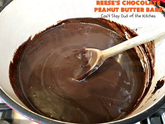 Reese's Chocolate Peanut Butter Bars | Can't Stay Out of the Kitchen | these outrageous #cookies start with an #OatmealCookie & #PeanutButter crust & topping. They have a #chocolate sauce & #ReesesPeanutButterCandies in the middle. Absolutely awesome! #tailgating #brownie #dessert #ChocolateDessert #PeanutButterDessert #ReesesPeanutButterDessert #ReesesChocolatePeanutButterBars