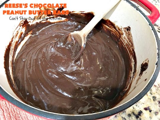 Reese's Chocolate Peanut Butter Bars | Can't Stay Out of the Kitchen | these outrageous #cookies start with an #OatmealCookie & #PeanutButter crust & topping. They have a #chocolate sauce & #ReesesPeanutButterCandies in the middle. Absolutely awesome! #tailgating #brownie #dessert #ChocolateDessert #PeanutButterDessert #ReesesPeanutButterDessert #ReesesChocolatePeanutButterBars