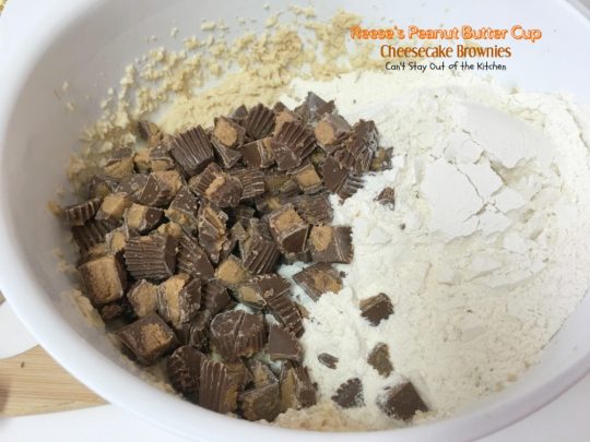 Reese's Peanut Butter Cup Cheesecake Brownies | Can't Stay Out of the Kitchen | these magnificent #brownies are divine! #Reese's #peanutbutter cups fill the cookie dough and they have a scrumptious #cheesecake layer to die for. #chocolate #dessert