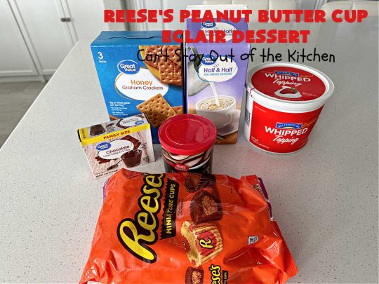 Reese's Peanut Butter Cup Éclair Dessert | Can't Stay Out of the Kitchen | Everyone swooned over this delightful #ÉclairDessert when I brought it for a #Christmas party. This easy 6-ingredient #recipe is so easy a child can make it. Plus, it's just so outrageously good everyone will want to sample it. Great for #ValentinesDay, special occasions & birthdays! #Reeses #ReesesPeanutButterCups #chocolate #PeanutButter #GrahamCrackers #Éclairs #6IngredientRecipe #ReesesPeanutButterCupÉclairDessert