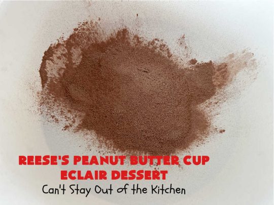 Reese's Peanut Butter Cup Éclair Dessert | Can't Stay Out of the Kitchen | Everyone swooned over this delightful #ÉclairDessert when I brought it for a #Christmas party. This easy 6-ingredient #recipe is so easy a child can make it. Plus, it's just so outrageously good everyone will want to sample it. Great for #ValentinesDay, special occasions & birthdays! #Reeses #ReesesPeanutButterCups #chocolate #PeanutButter #GrahamCrackers #Éclairs #6IngredientRecipe #ReesesPeanutButterCupÉclairDessert