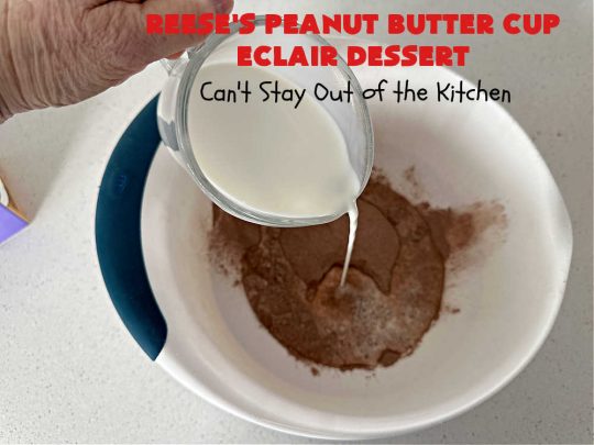 Reese's Peanut Butter Cup Éclair Dessert | Can't Stay Out of the Kitchen | Everyone swooned over this delightful #ÉclairDessert when I brought it for a #Christmas party. This easy 6-ingredient #recipe is so easy a child can make it. Plus, it's just so outrageously good everyone will want to sample it. Great for #ValentinesDay, special occasions & birthdays! #Reeses #ReesesPeanutButterCups #chocolate #PeanutButter #GrahamCrackers #Éclairs #6IngredientRecipe #ReesesPeanutButterCupÉclairDessert