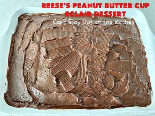 Reese's Peanut Butter Cup Éclair Dessert | Can't Stay Out of the Kitchen | Everyone swooned over this delightful #ÉclairDessert when I brought it for a #Christmas party. This easy 6-ingredient #recipe is so easy a child can make it. Plus, it's just so outrageously good everyone will want to sample it. Great for #ValentinesDay, special occasions & birthdays! #Reeses #ReesesPeanutButterCups #chocolate #PeanutButter #GrahamCrackers #Éclairs #6IngredientRecipe #ReesesPeanutButterCupÉclairDessert