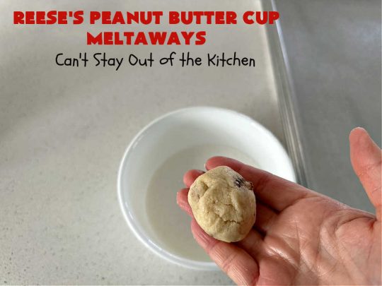 Reese's Peanut Butter Cup Meltaways | Can't Stay Out of the Kitchen | these glorious #cookies simply dissolve in your mouth! They're fantastic #SugarCookies with #ReesesPeanutButterCups added. They're so swoon-worthy you'll be drooling over every bite. Great for #tailgating parties, potlucks & #holiday #baking. #chocolate #PeanutButter #ReesesPeanutButterCupMeltaways