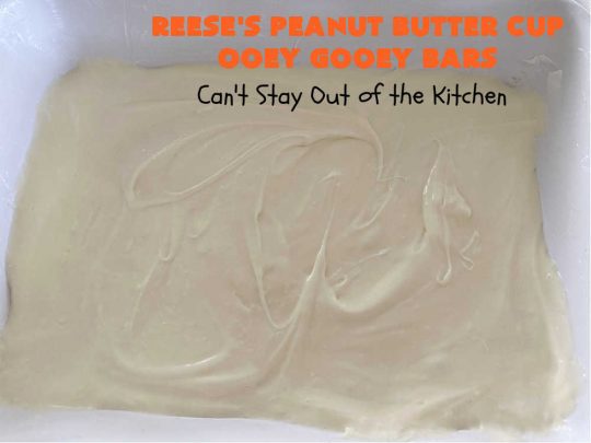 Reese's Peanut Butter Cup Ooey Gooey Bars | Can't Stay Out of the Kitchen | This fabulous #OoeyGooeyBar #recipe uses only 6 ingredients! It has a luscious #cheesecake filling & it's topped with #ReesesPeanutButterCups. Every bite will have you swooning! Great for #holiday #baking, #tailgating parties, a #ChristmasCookieExchange or any time you just need #chocolate! #PeanutButter #dessert #brownie #cookie #CreamCheese #ReesesPeanutButterCupOoeyGooeyBars