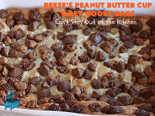 Reese's Peanut Butter Cup Ooey Gooey Bars | Can't Stay Out of the Kitchen | This fabulous #OoeyGooeyBar #recipe uses only 6 ingredients! It has a luscious #cheesecake filling & it's topped with #ReesesPeanutButterCups. Every bite will have you swooning! Great for #holiday #baking, #tailgating parties, a #ChristmasCookieExchange or any time you just need #chocolate! #PeanutButter #dessert #brownie #cookie #CreamCheese #ReesesPeanutButterCupOoeyGooeyBars