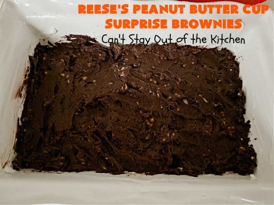 Reese's Peanut Butter Cup Surprise Brownies | Can't Stay Out of the Kitchen | These delectable #brownies have a wonderful "surprise" in each bite. A #ReesesPeanutButterCup is buried in each one. This fantastic over-the-top #dessert will have you swooning. Great for #tailgating parties, the #SuperBowl, #MarchMadness & other sporting events. #chocolate #PeanutButter #ReesesPeanutButterCupSurpriseBrownies