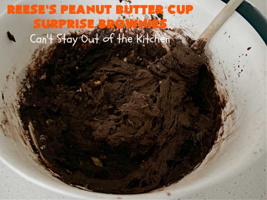 Reese's Peanut Butter Cup Surprise Brownies | Can't Stay Out of the Kitchen | These delectable #brownies have a wonderful "surprise" in each bite. A #ReesesPeanutButterCup is buried in each one. This fantastic over-the-top #dessert will have you swooning. Great for #tailgating parties, the #SuperBowl, #MarchMadness & other sporting events. #chocolate #PeanutButter #ReesesPeanutButterCupSurpriseBrownies