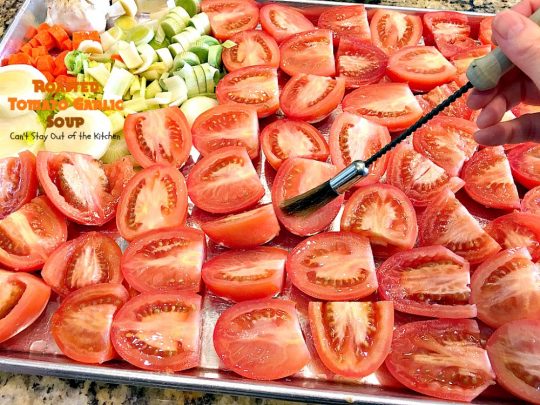 Roasted Tomato Garlic Soup | Can't Stay Out of the Kitchen | this amazing #soup roasts all the #tomatoes & veggies including a whole bulb of garlic. Wonderful comfort food that's #vegan if you omit the #parmesancheese for garnish. #glutenfree