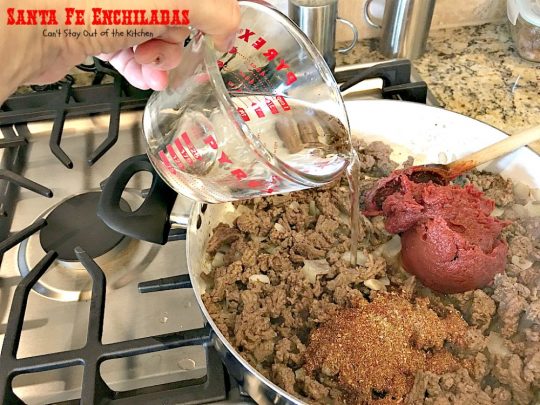 Santa Fe Enchiladas | Can't Stay Out of the Kitchen | these delicious #enchiladas have a #beef filling without beans. Then they're drenched in a cheesy #Velveeta sauce with #greenchilies & topped with more beef sauce. #Tex-Mex