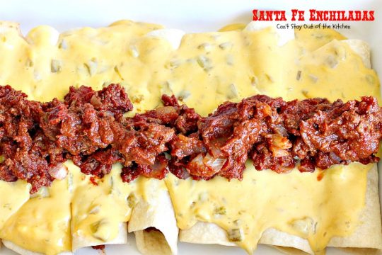 Santa Fe Enchiladas | Can't Stay Out of the Kitchen | these delicious #enchiladas have a #beef filling without beans. Then they're drenched in a cheesy #Velveeta sauce with #greenchilies & topped with more beef sauce. #Tex-Mex