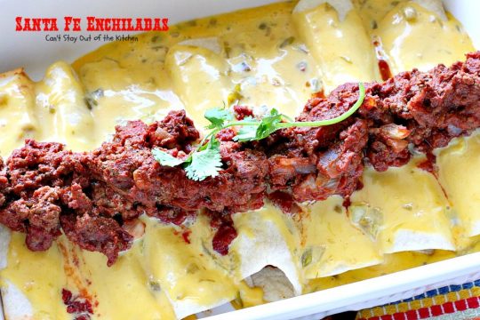 Santa Fe Enchiladas | Can't Stay Out of the Kitchen | these delicious #enchiladas have a #beef filling without beans. Then they're drenched in a cheesy #Velveeta sauce with #greenchilies & topped with more beef sauce. #Tex-Mex