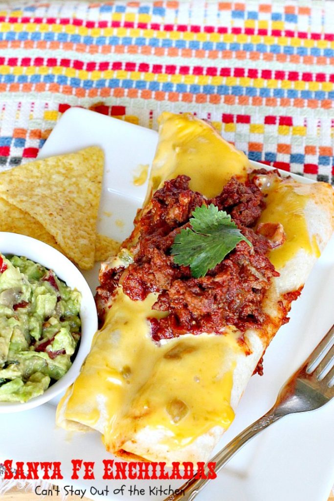 Santa Fe Enchiladas | Can't Stay Out of the Kitchen | these delicious #enchiladas have a #beef filling without beans. Then they're drenched in a cheesy #Velveeta sauce with #greenchilies & topped with more beef sauce. #Tex-Mex