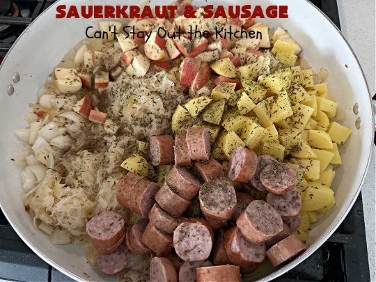 Sauerkraut and Sausage | Can't Stay Out of the Kitchen | this easy #MainDish #recipe is a great option for busy weeknight dinners. You'll enjoy the savory #pork flavors which include both #bacon & #kielbasa. Apples, #potatoes, #sauerkraut & #CarawaySeeds finish off this fantastic #SauerkrautAndSausage #entree. The savory & sweet flavors contrast so wonderfully that every bite is irresistible. #GlutenFree