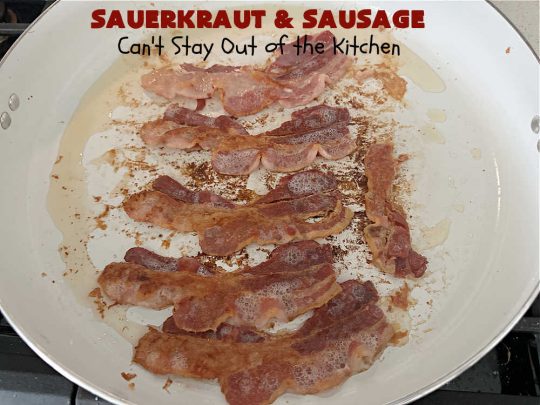 Sauerkraut and Sausage | Can't Stay Out of the Kitchen | this easy #MainDish #recipe is a great option for busy weeknight dinners. You'll enjoy the savory #pork flavors which include both #bacon & #kielbasa. Apples, #potatoes, #sauerkraut & #CarawaySeeds finish off this fantastic #SauerkrautAndSausage #entree. The savory & sweet flavors contrast so wonderfully that every bite is irresistible. #GlutenFree