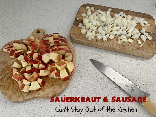 Sauerkraut and Sausage | Can't Stay Out of the Kitchen | this easy #MainDish #recipe is a great option for busy weeknight dinners. You'll enjoy the savory #pork flavors which include both #bacon & #kielbasa. Apples, #potatoes, #sauerkraut & #CarawaySeeds finish off this fantastic #SauerkrautAndSausage #entree. The savory & sweet flavors contrast so wonderfully that every bite is irresistible. #GlutenFree