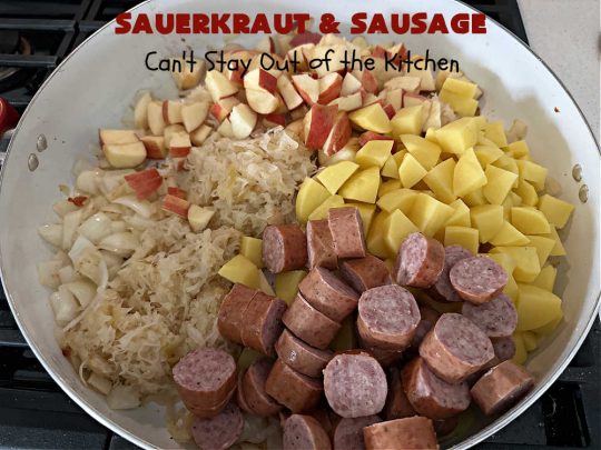 Sauerkraut and Sausage | Can't Stay Out of the Kitchen | this easy #MainDish #recipe is a great option for busy weeknight dinners. You'll enjoy the savory #pork flavors which include both #bacon & #kielbasa. Apples, #potatoes, #sauerkraut & #CarawaySeeds finish off this fantastic #SauerkrautAndSausage #entree. The savory & sweet flavors contrast so wonderfully that every bite is irresistible. #GlutenFree