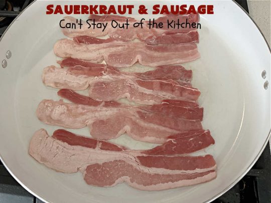 Sauerkraut and Sausage | Can't Stay Out of the Kitchen | this easy #MainDish #recipe is a great option for busy weeknight dinners. You'll enjoy the savory #pork flavors which include both #bacon & #kielbasa. Apples, #potatoes, #sauerkraut & #CarawaySeeds finish off this fantastic #SauerkrautAndSausage #entree. The savory & sweet flavors contrast so wonderfully that every bite is irresistible. #GlutenFree