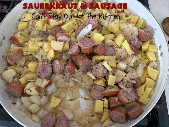 Sauerkraut and Sausage | Can't Stay Out of the Kitchen | this easy #MainDish #recipe is a great option for busy weeknight dinners. You'll enjoy the savory #pork flavors which include both #bacon & #kielbasa. Apples, #potatoes, #sauerkraut & #CarawaySeeds finish off this fantastic #SauerkrautAndSausage #entree. The savory & sweet flavors contrast so wonderfully that every bite is irresistible. #GlutenFree