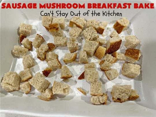 Sausage Mushroom Breakfast Bake | Can't Stay Out of the Kitchen | this #BreakfastCasserole is a delightful change-of-pace from traditional #breakfast #casseroles. This one includes #sausage, #mushrooms, #tomatoes, #eggs #CheddarCheese, #SourdoughBread & is seasoned with #parsley & #chives. It's big on taste & perfect for a weekend, company or #holiday #breakfast or #brunch. Your family & friends will enjoy every bite! #BreakfastBake #SausageMushroomBreakfastBake