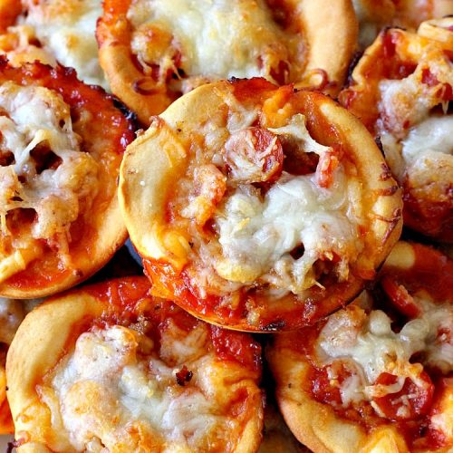 Sausage Pepperoni Pizza Cups | Can't Stay Out of the Kitchen | these outrageous miniature #pizzas are terrific for #holiday parties, #NewYearsDay, #tailgating parties & the #SuperBowl. This amazing 5-ingredient #recipe will rock your world! Every bite is sumptuous & irresistible. #sausage #pepperoni #MozzarellaCheese #MiniaturePizza #SausagePepperoniPizzaCups