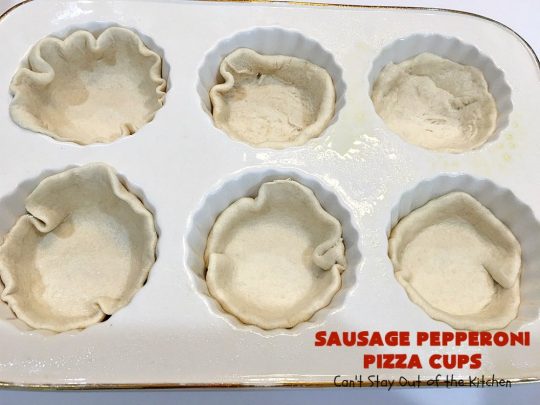 Sausage Pepperoni Pizza Cups | Can't Stay Out of the Kitchen | these outrageous miniature #pizzas are terrific for #holiday parties, #NewYearsDay, #tailgating parties & the #SuperBowl. This amazing 5-ingredient #recipe will rock your world! Every bite is sumptuous & irresistible. #sausage #pepperoni #MozzarellaCheese #MiniaturePizza #SausagePepperoniPizzaCups