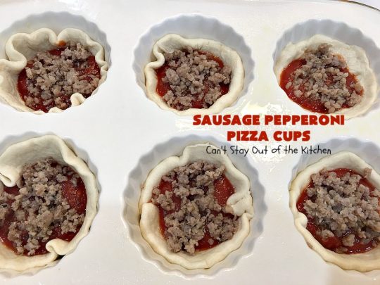 Sausage Pepperoni Pizza Cups | Can't Stay Out of the Kitchen | these outrageous miniature #pizzas are terrific for #holiday parties, #NewYearsDay, #tailgating parties & the #SuperBowl. This amazing 5-ingredient #recipe will rock your world! Every bite is sumptuous & irresistible. #sausage #pepperoni #MozzarellaCheese #MiniaturePizza #SausagePepperoniPizzaCups