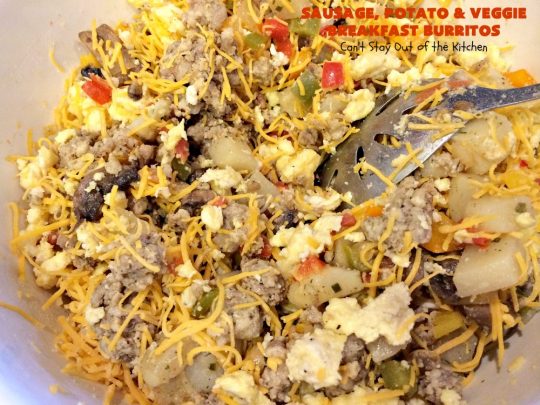 Sausage, Potato and Veggie Breakfast Burritos | Can't Stay Out of the Kitchen | these #BreakfastBurritos are fantastic. Every mouthful will have you drooling. Plus, they can be made up in advance & then popped in the microwave before heading out to work! #sausage #pork #eggs #cheese #potatoes #mushrooms #tortillas #TexMex #breakfast #HolidayBreakfast #SausagePotatoAndVeggieBreakfastBurritos