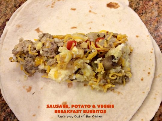 Sausage, Potato and Veggie Breakfast Burritos | Can't Stay Out of the Kitchen | these #BreakfastBurritos are fantastic. Every mouthful will have you drooling. Plus, they can be made up in advance & then popped in the microwave before heading out to work! #sausage #pork #eggs #cheese #potatoes #mushrooms #tortillas #TexMex #breakfast #HolidayBreakfast #SausagePotatoAndVeggieBreakfastBurritos
