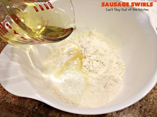Sausage Swirls | Can't Stay Out of the Kitchen | Terrific #brunch idea for the #holidays. Roll up cooked #sausage in pie crust, bake & voila! You have the best #breakfast imaginable. #HolidayBreakfast #ChristmasBreakfast #NewYearsDayBreakfast #pork #SausageBreakfast