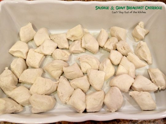Sausage and Gravy Biscuit Casserole | Can't Stay Out of the Kitchen | one of the BEST #breakfast #casseroles you'll ever eat. This one tastes just like eating #sausage #biscuits and #gravy!