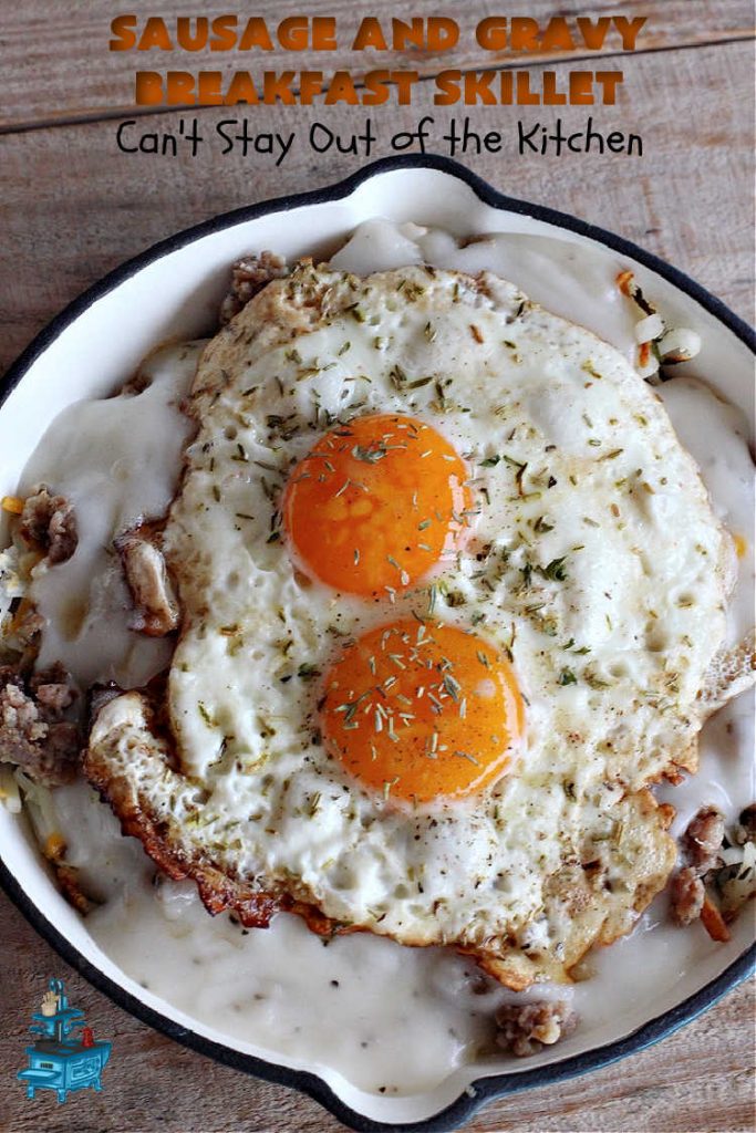 Sausage and Gravy Breakfast Skillet | Can't Stay Out of the Kitchen | this fantastic #BreakfastSkillet includes #SausageAndGravy which offers a down-home #southern #breakfast you're sure to love. This one includes #HashBrowns, both #Cheddar & #MontereyJack cheeses and sunny-side-up #eggs. Hearty, filling & so satisfying. Great for a weekend, company or #HolidayBreakfast. #holiday #FathersDay #FathersDayBreakfast #sausage #SausageAndGravyBreakfastSkillet