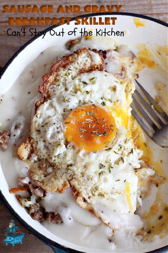 Sausage and Gravy Breakfast Skillet | Can't Stay Out of the Kitchen | this fantastic #BreakfastSkillet includes #SausageAndGravy which offers a down-home #southern #breakfast you're sure to love. This one includes #HashBrowns, both #Cheddar & #MontereyJack cheeses and sunny-side-up #eggs. Hearty, filling & so satisfying. Great for a weekend, company or #HolidayBreakfast. #holiday #FathersDay #FathersDayBreakfast #sausage #SausageAndGravyBreakfastSkillet