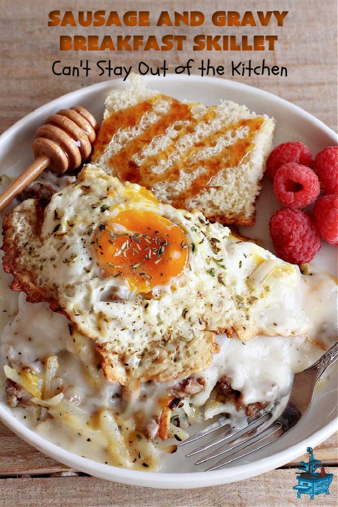 Sausage and Gravy Breakfast Skillet | Can't Stay Out of the Kitchen | this fantastic #BreakfastSkillet includes #SausageAndGravy which offers a down-home #southern #breakfast you're sure to love. This one includes #HashBrowns, both #Cheddar & #MontereyJack cheeses and sunny-side-up #eggs. Hearty, filling & so satisfying. Great for a weekend, company or #HolidayBreakfast. #holiday #FathersDay #FathersDayBreakfast #sausage #SausageAndGravyBreakfastSkillet